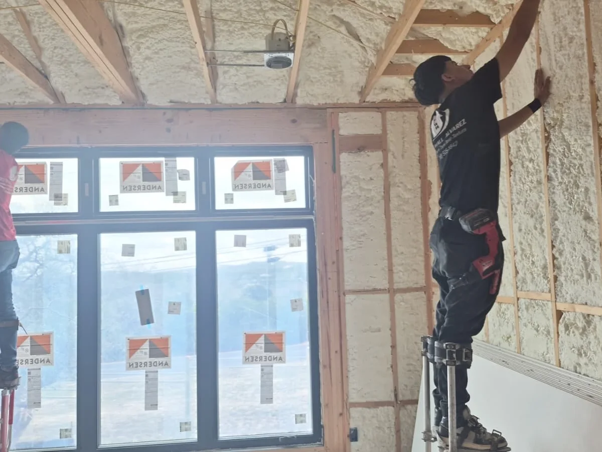 Spray insulation going into a framed wall